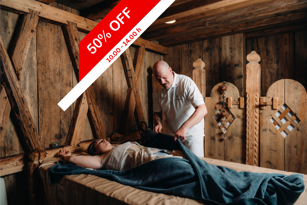 Massage du dos avec enveloppement au fango
