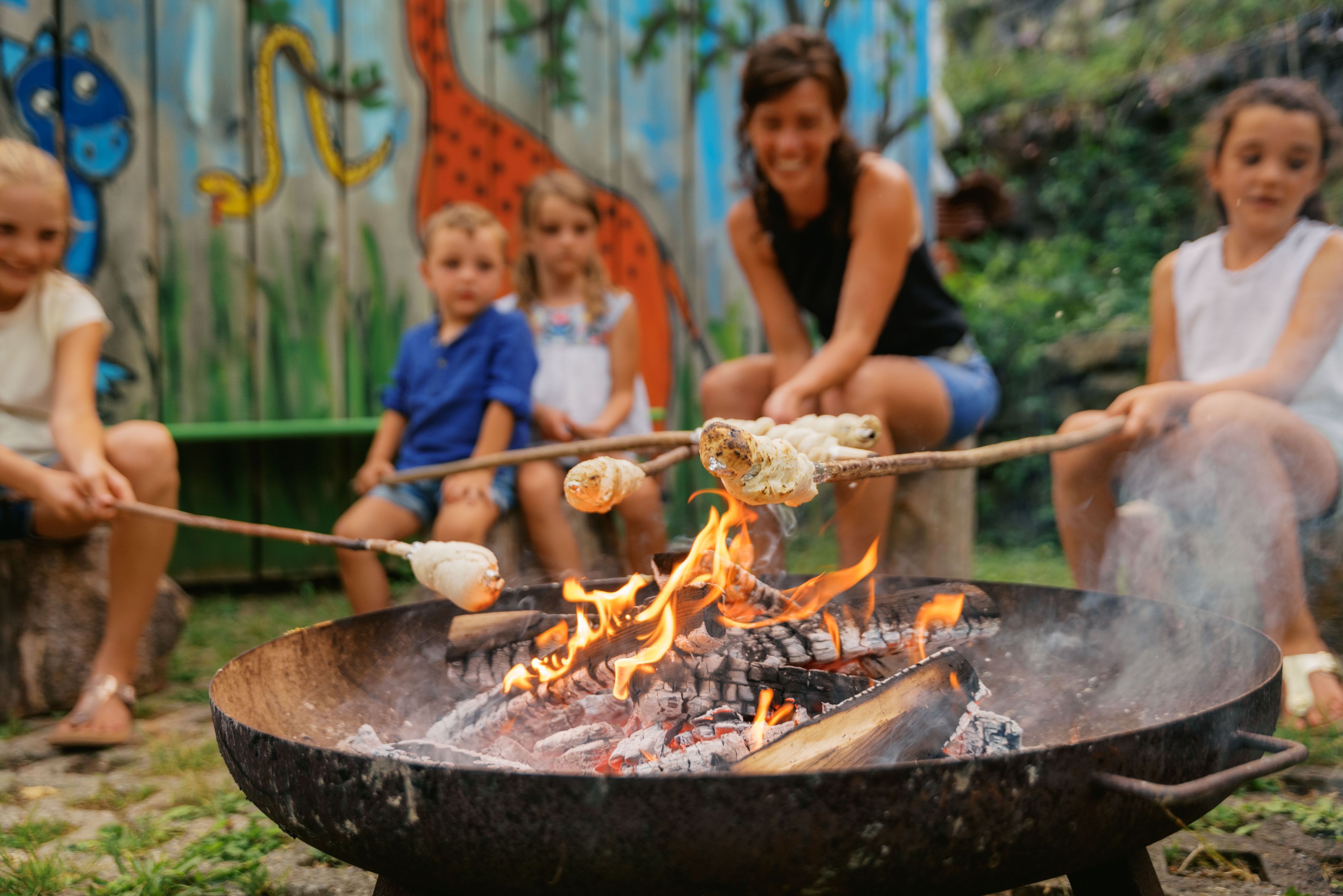 Bread on a stick and roasting marshmallows over the campfire