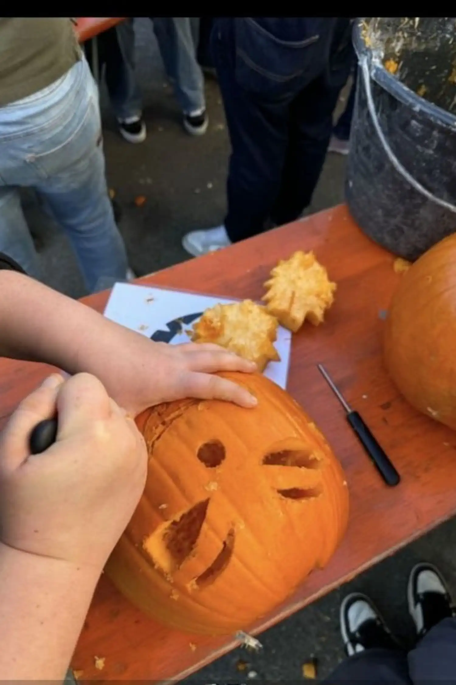 Carving at the pumpkin festival - giving pumpkins a face
