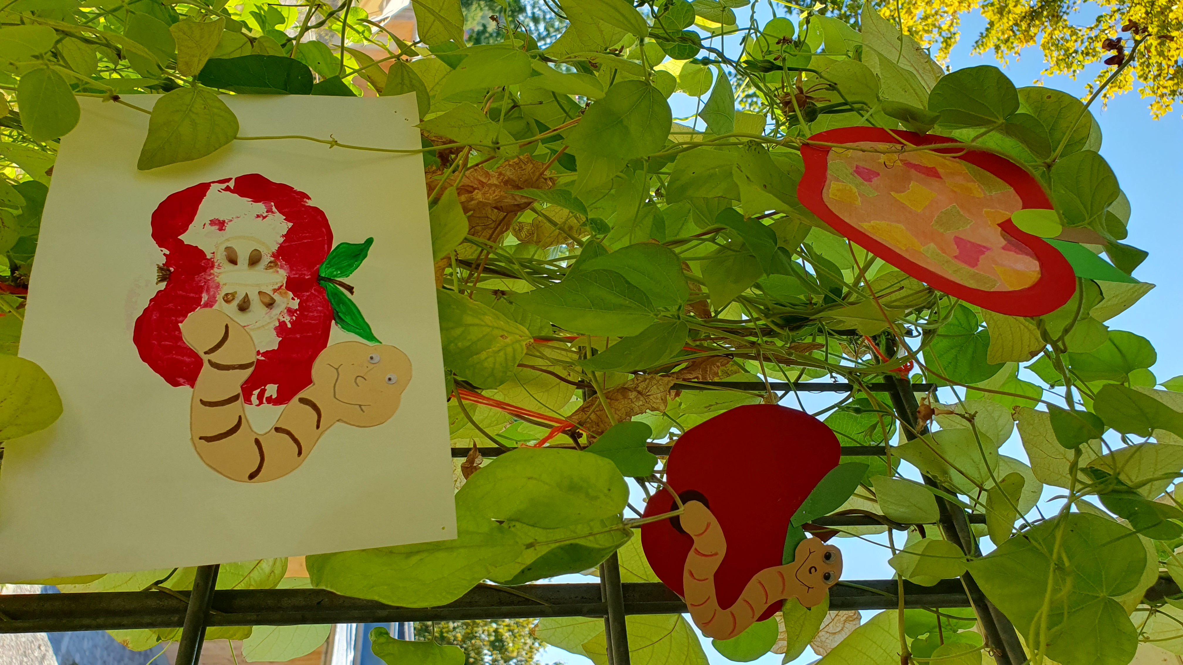 Family experience - stamping, cutting and painting colorful apples