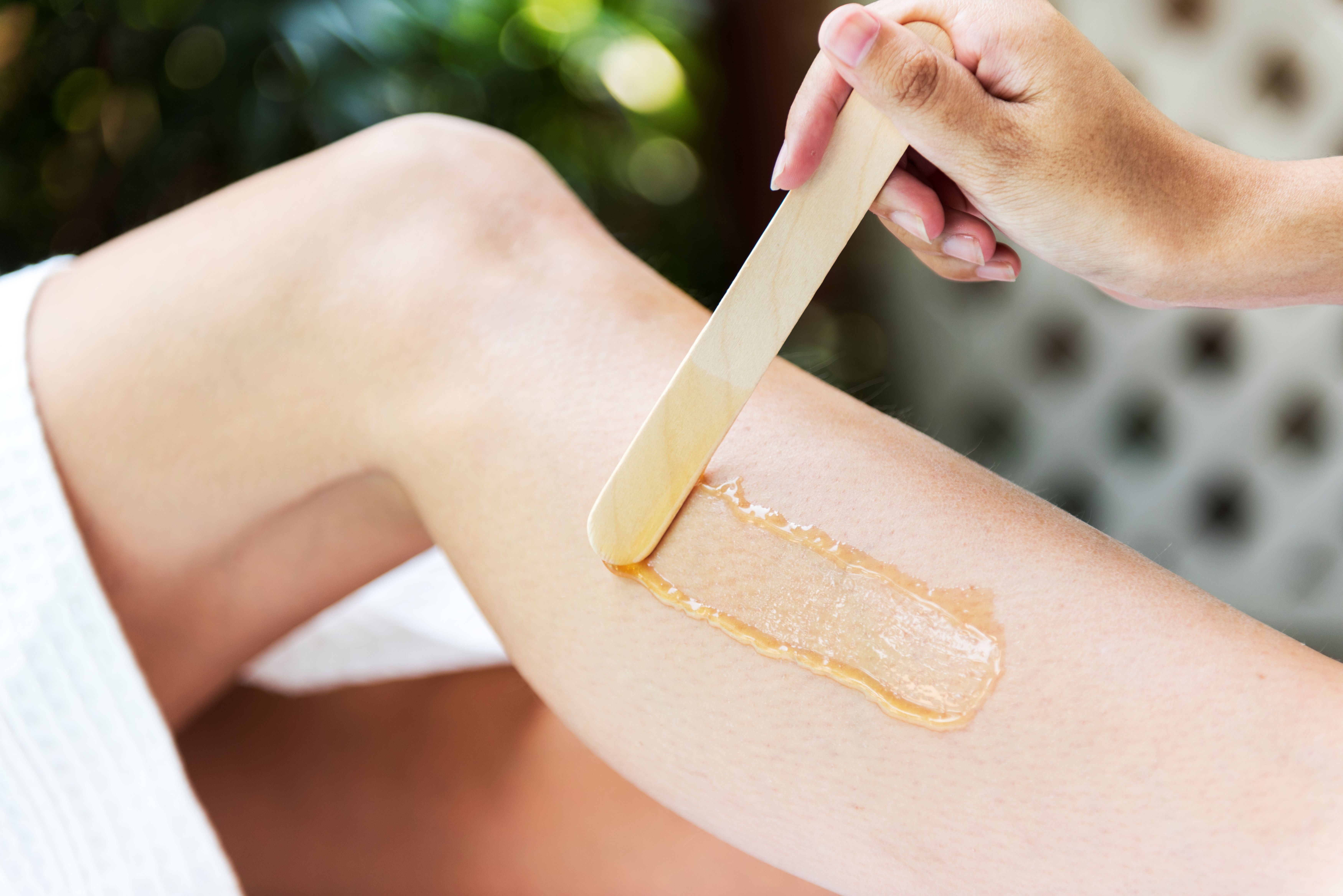 Hair removal with warm wax