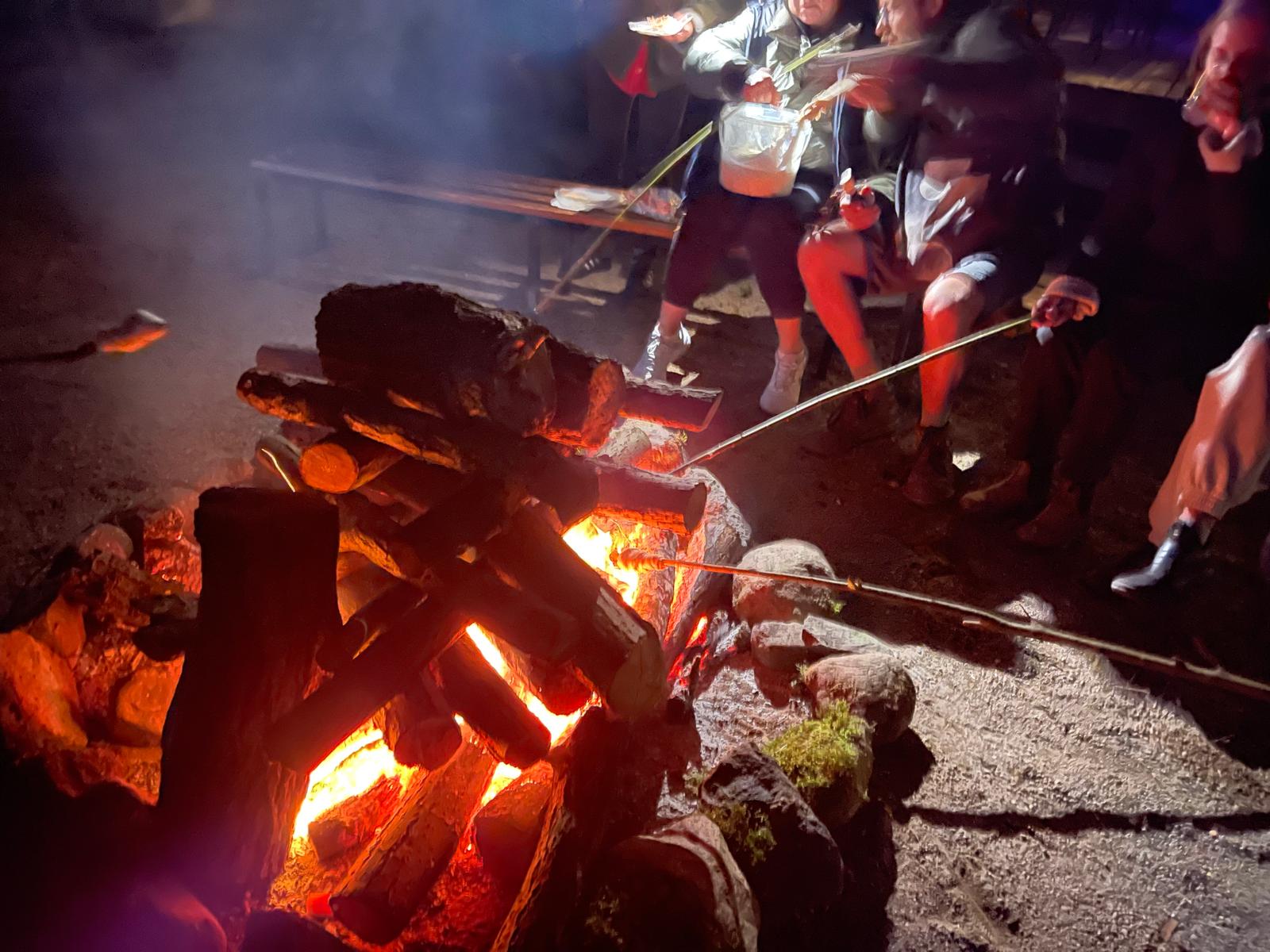 Just be. Enjoy together: Campfire & bread on a stick