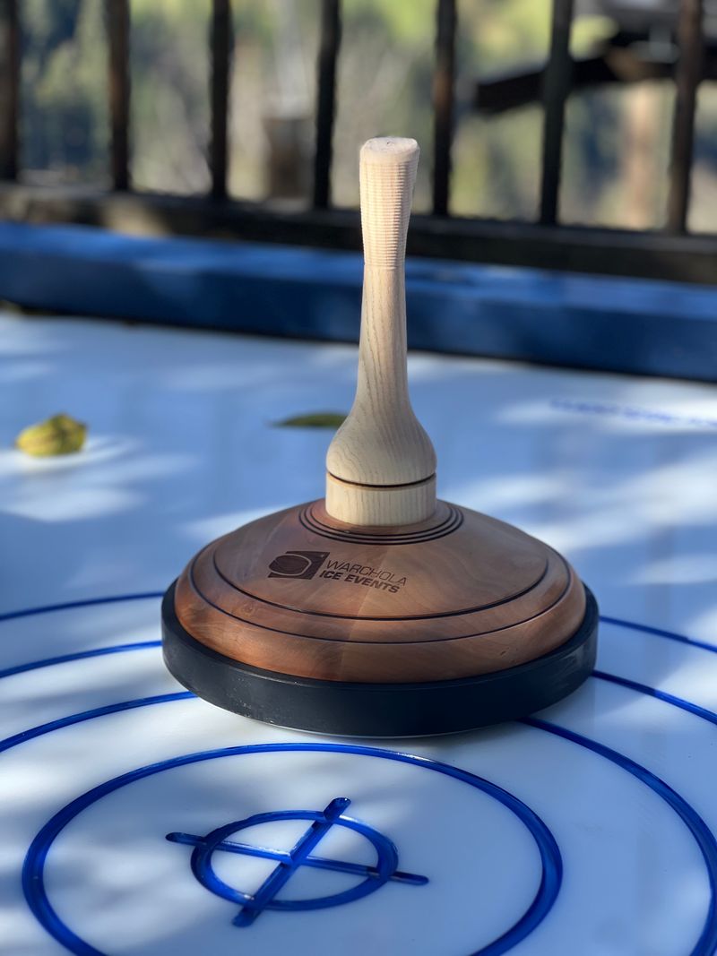 Curling on the terrace with fitness trainer Phil