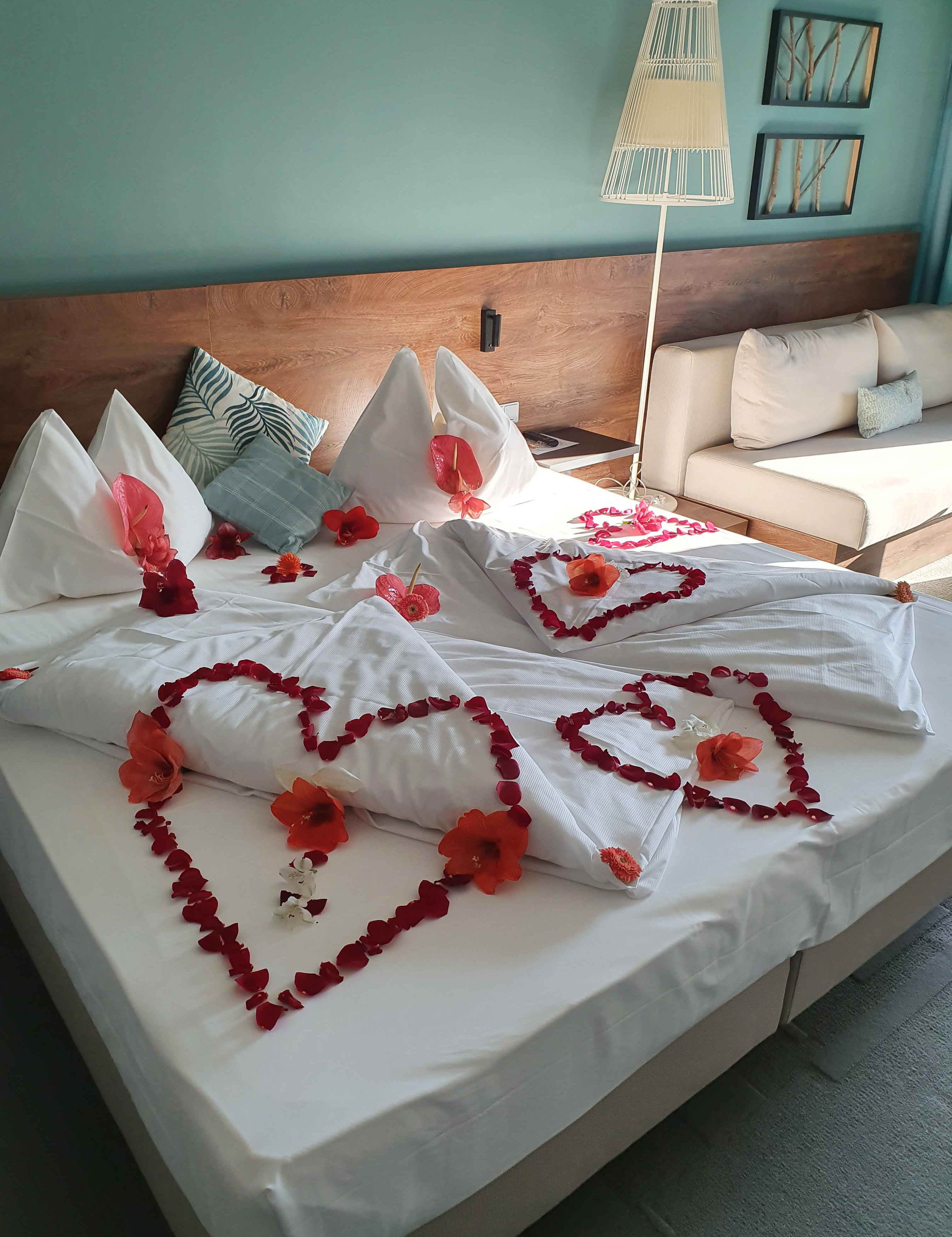 ROSE PETALS BY THE BED